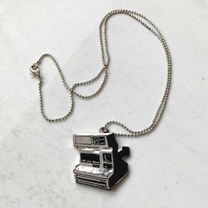 Claires polaroid pendant only - chain has been lost